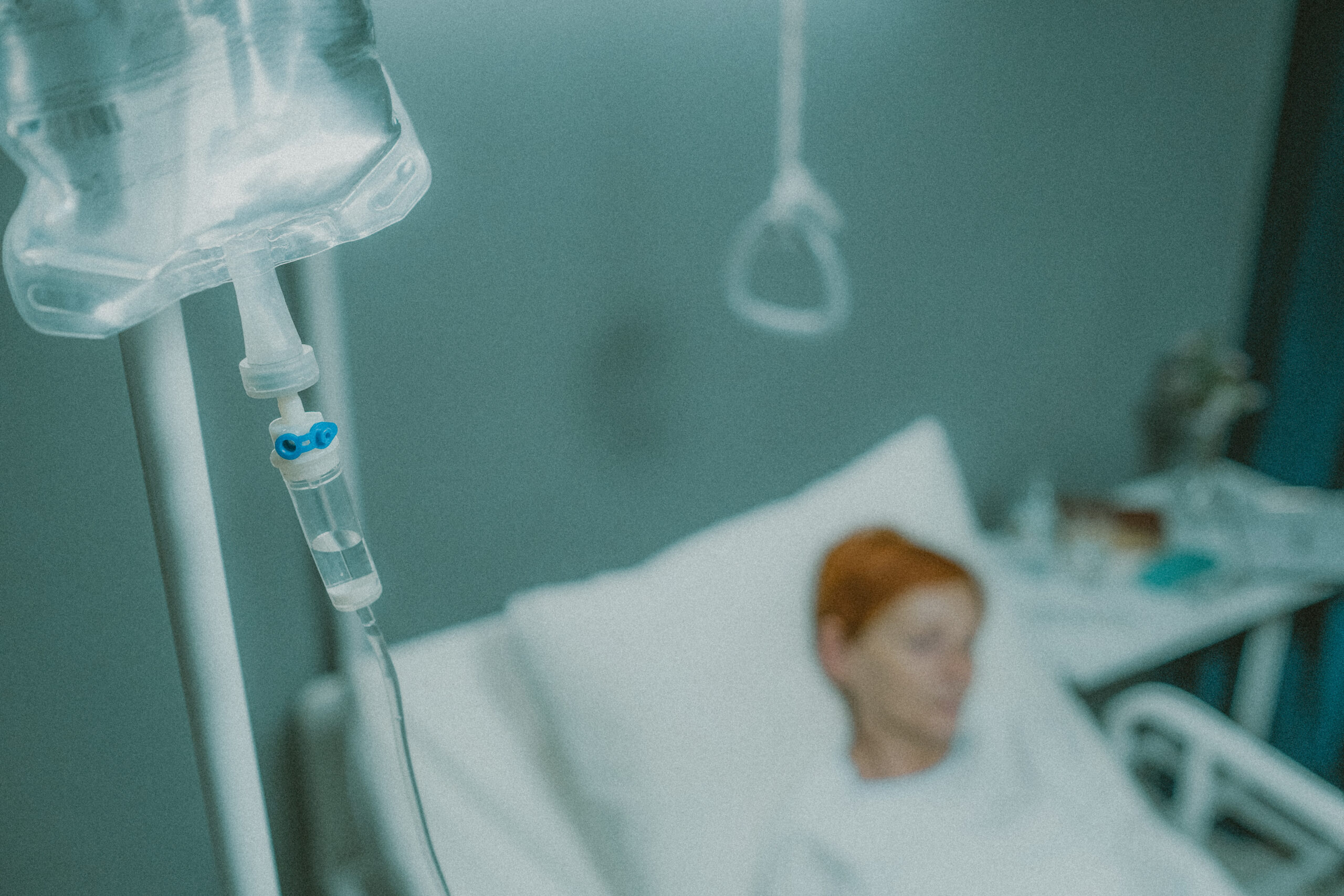 lying in a hospital bed