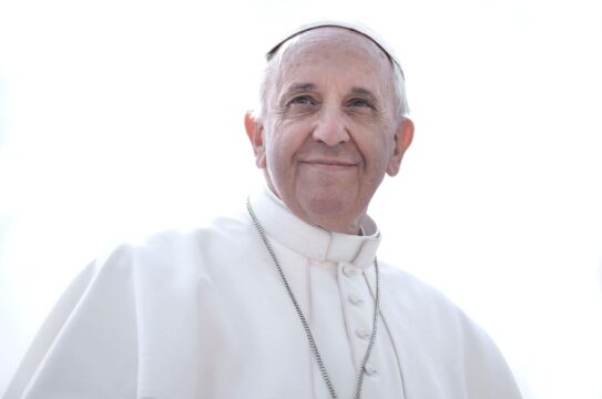 Pope Francis looking up and smiling