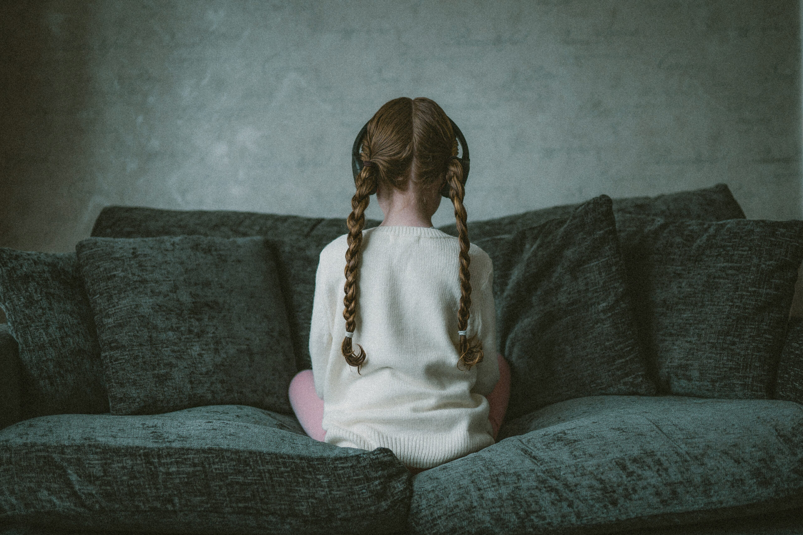 little girl with her back to the camera