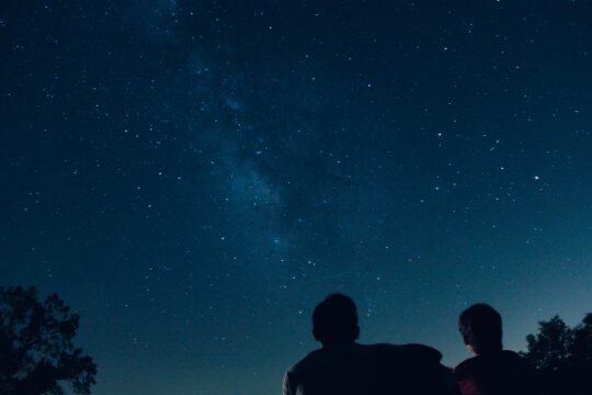 staring in wonder and awe at a sky full of stars