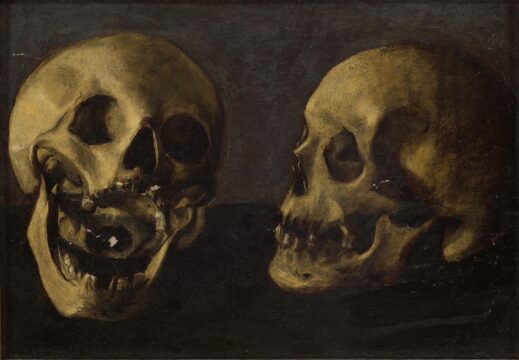 2 skulls on a black background