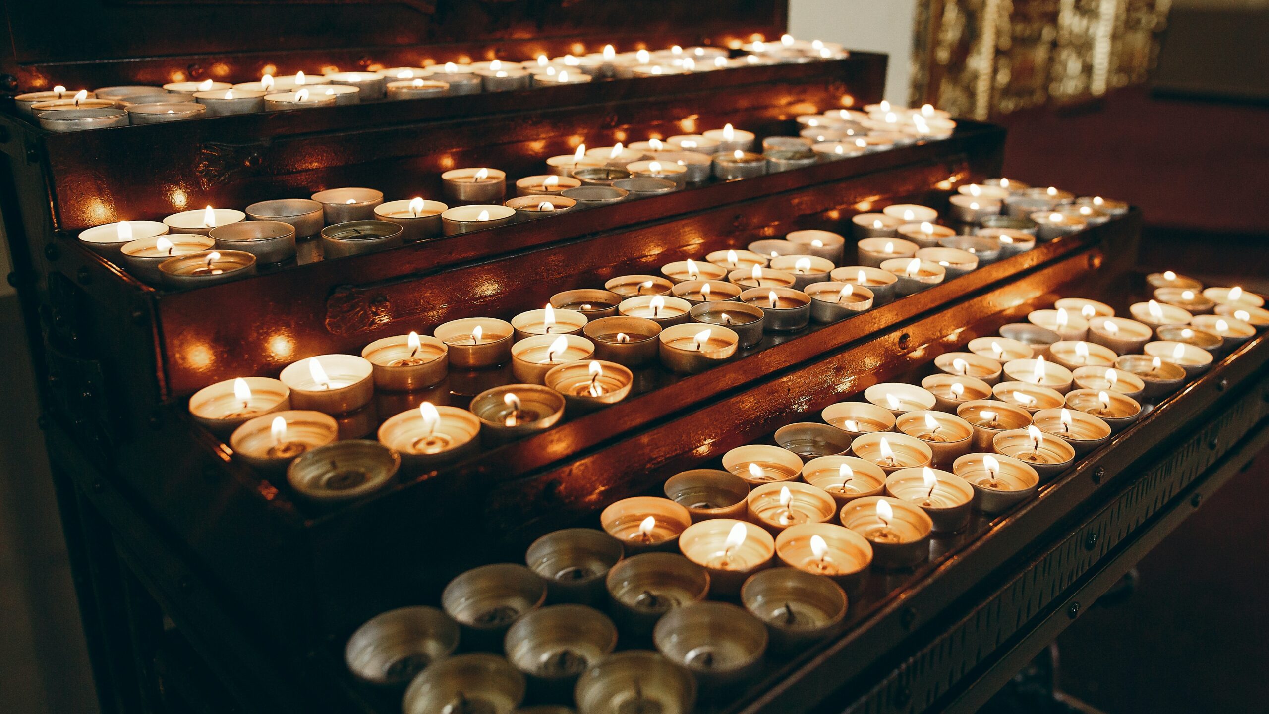 candles lit in a church
