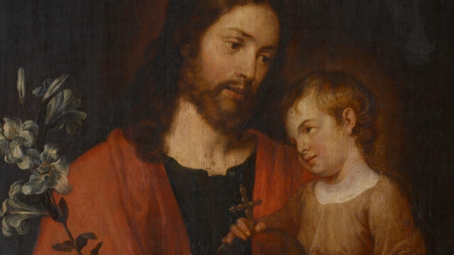 Joseph smiling at the child Jesus