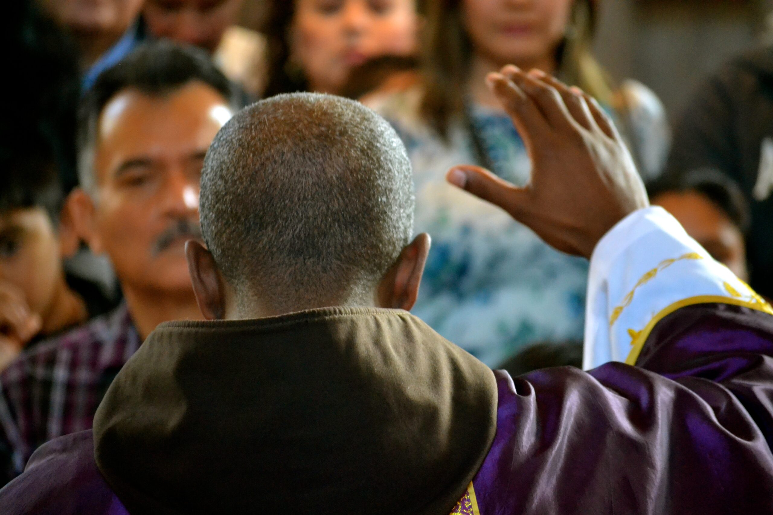 Priest giving a blessing