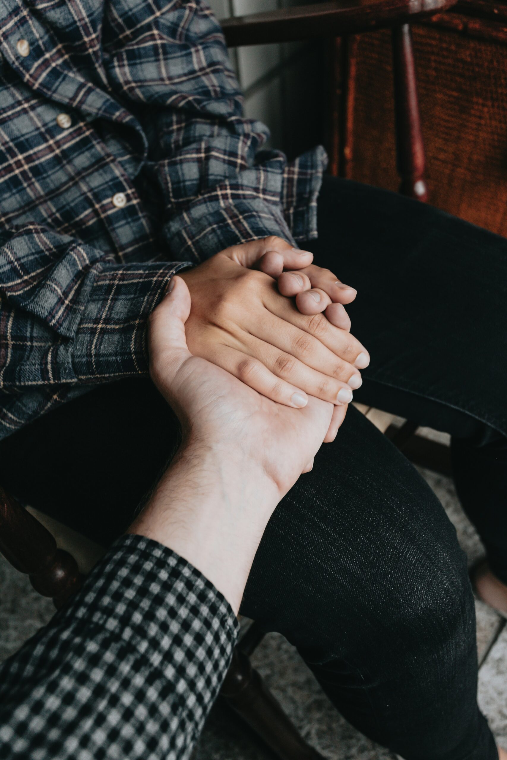 two people holding hands
