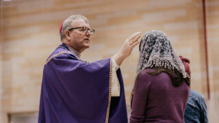 Bishop Barron giving ashes on Ash Wednesday