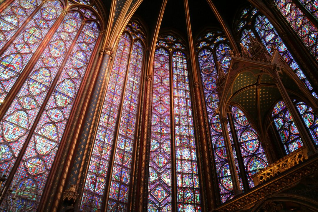 church interior showing tall, ornate windows