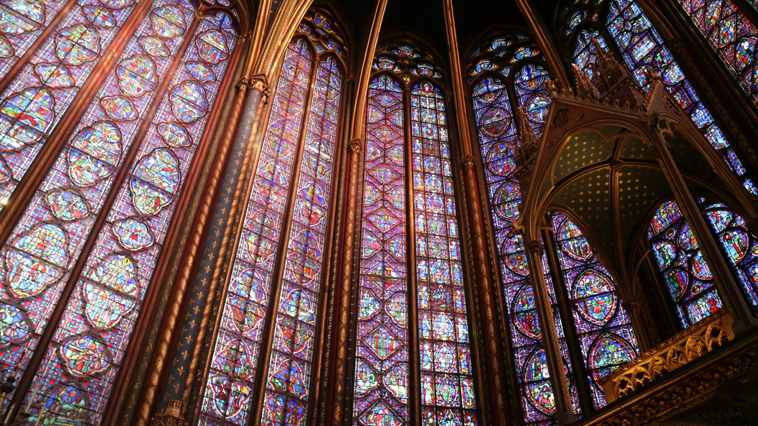 church interior showing tall, ornate windows