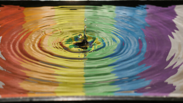 LGBTQ rainbow ripple in water