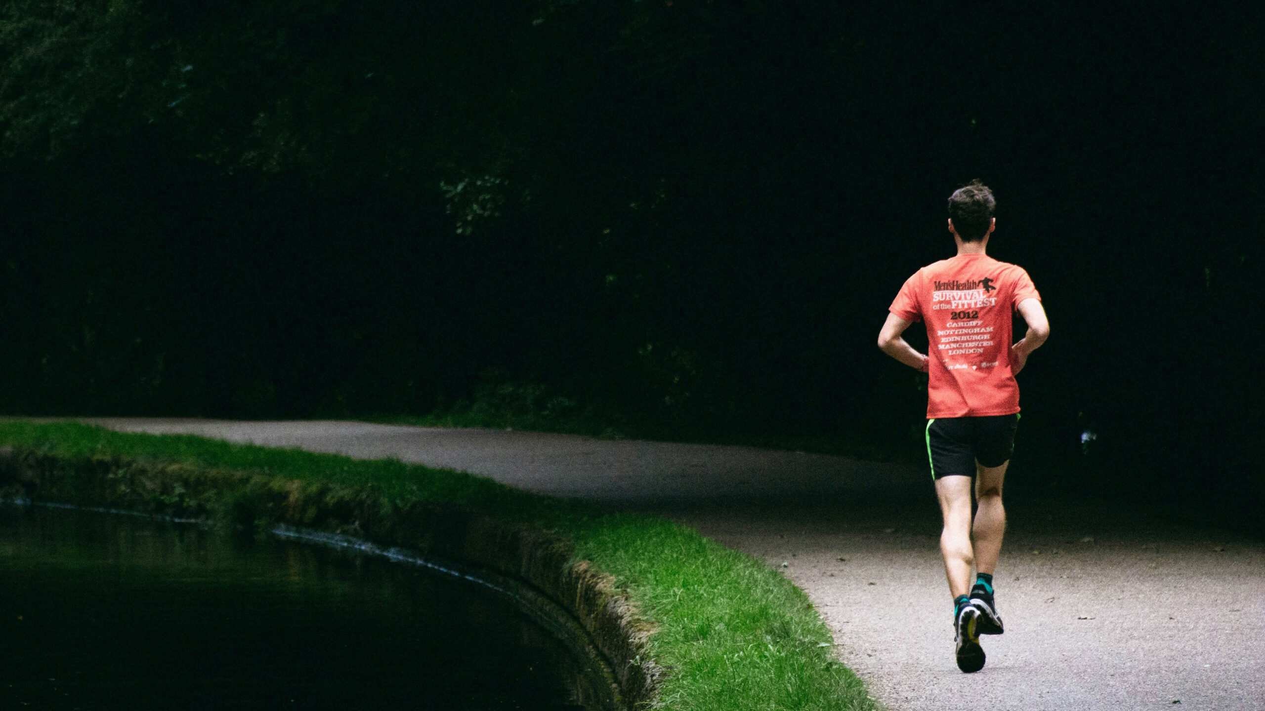 View of a runner running along a path