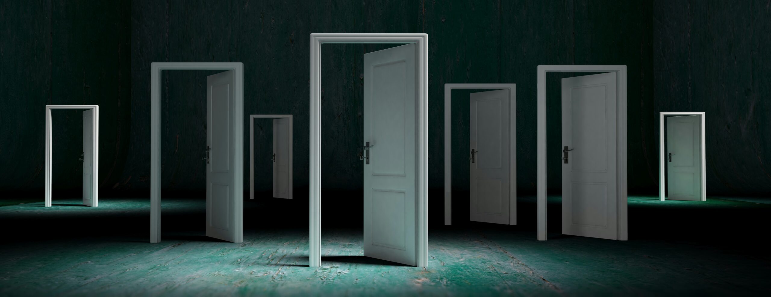 a dark room full of open doorways