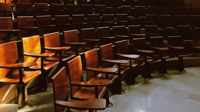 rows of seats in a large classroom