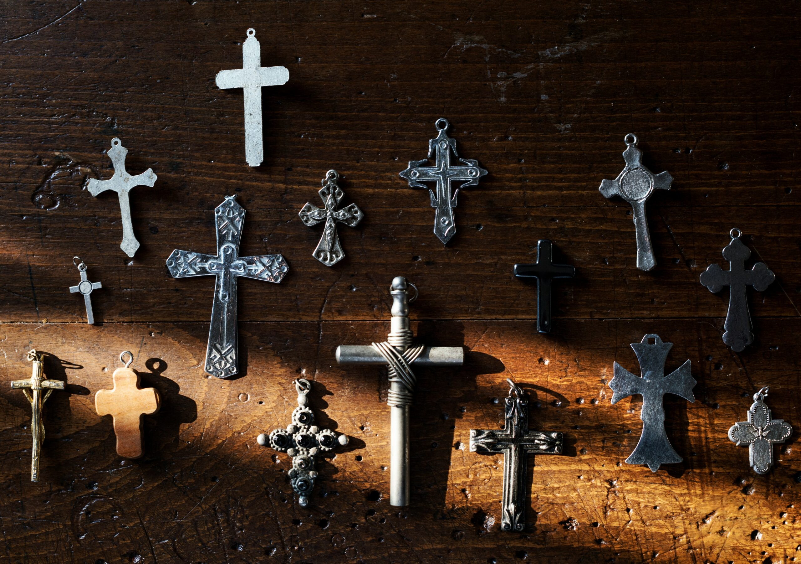 Crucifixes spread around a table top