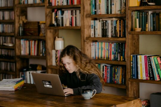 girl reading in a library
