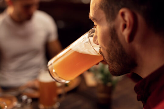 Man drinking a beer