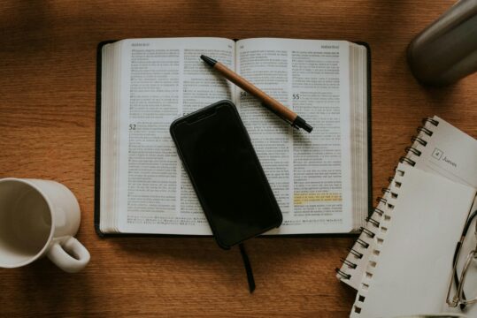 phone on top of an open book