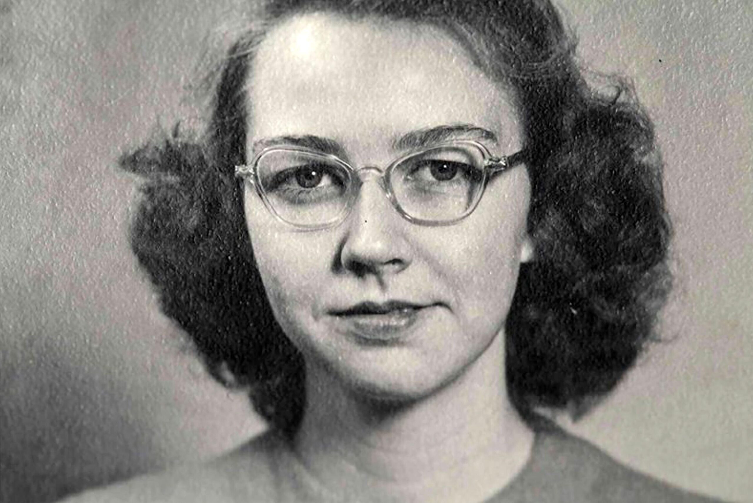 black and white woman with glasses
