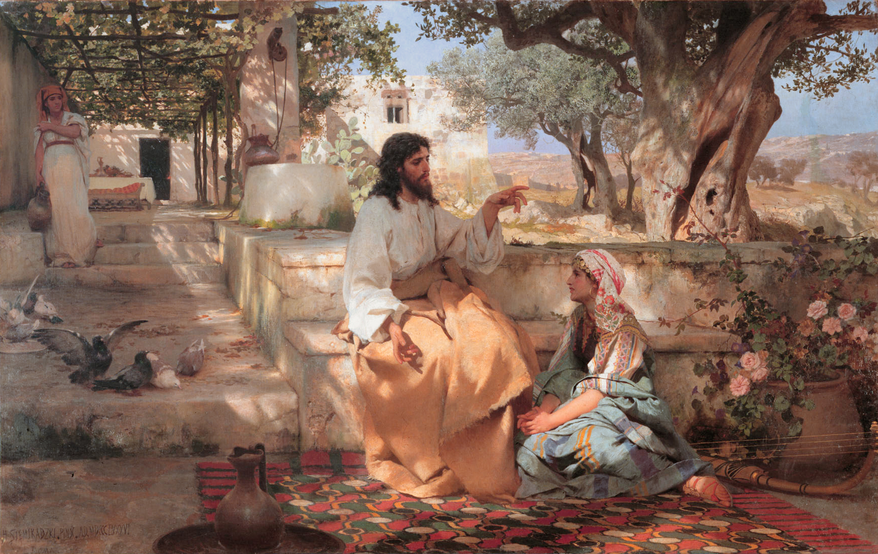 man teaching two women on ground