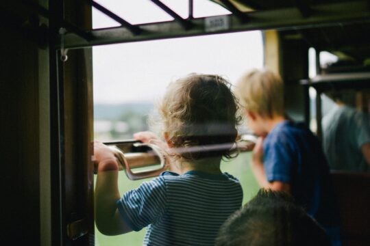 kid looking out window