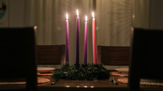 candles lit on a table