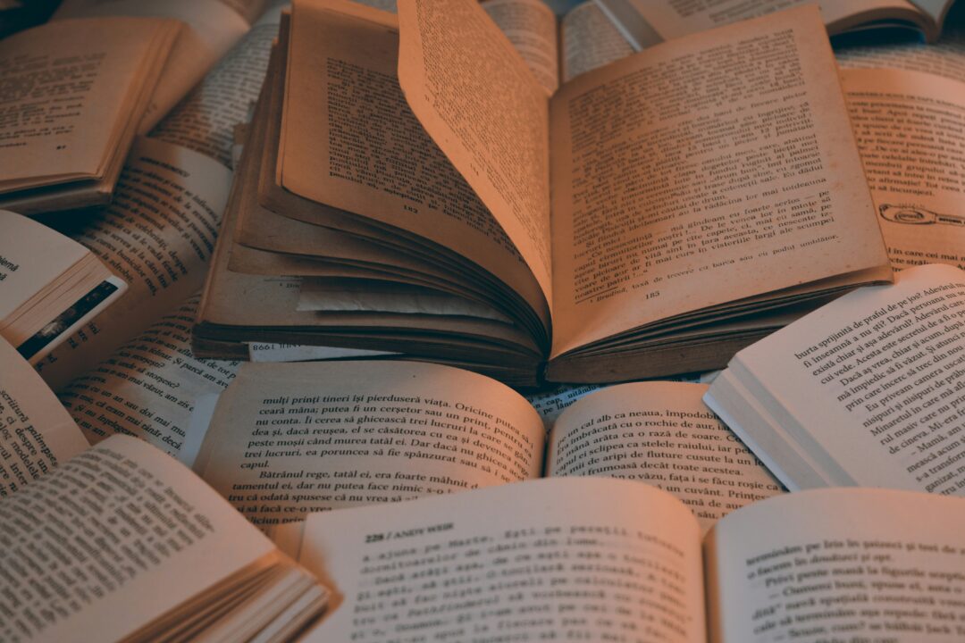 a pile of open books