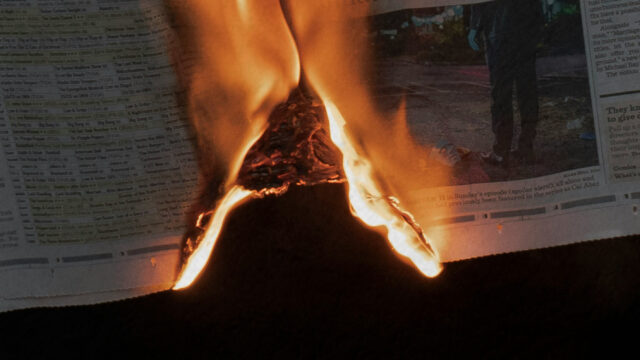 Newspaper on fire