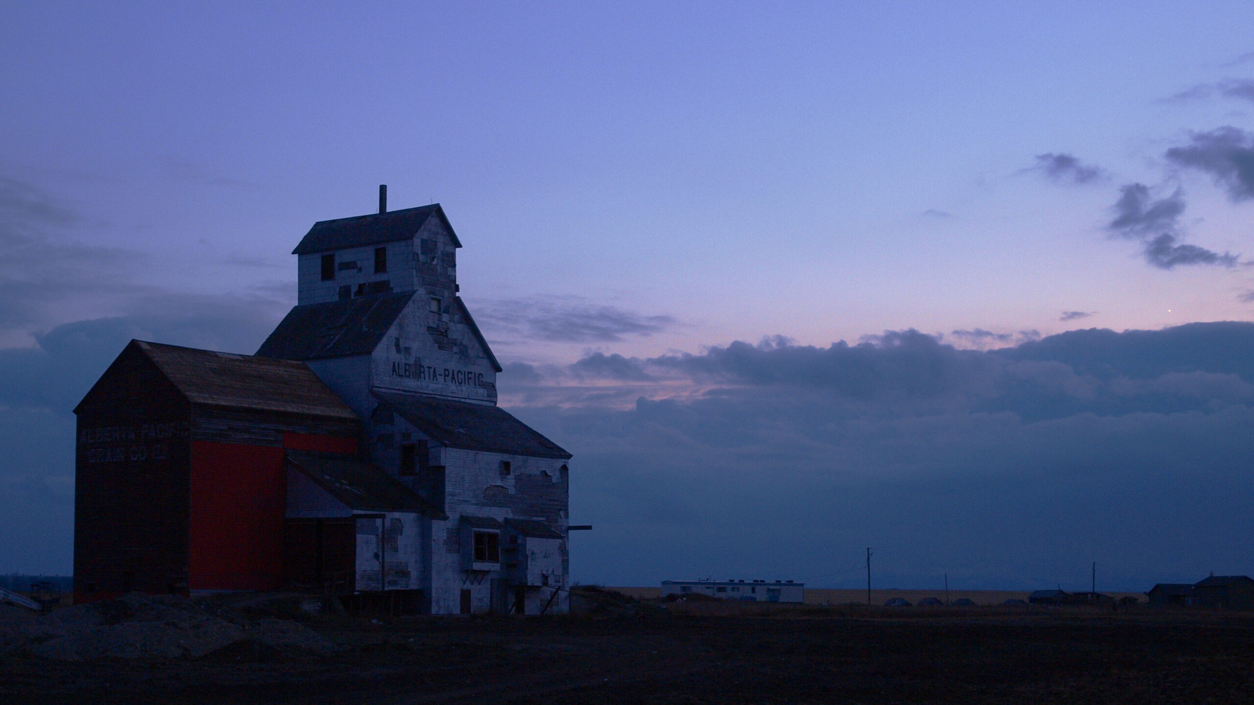 farm building in a field